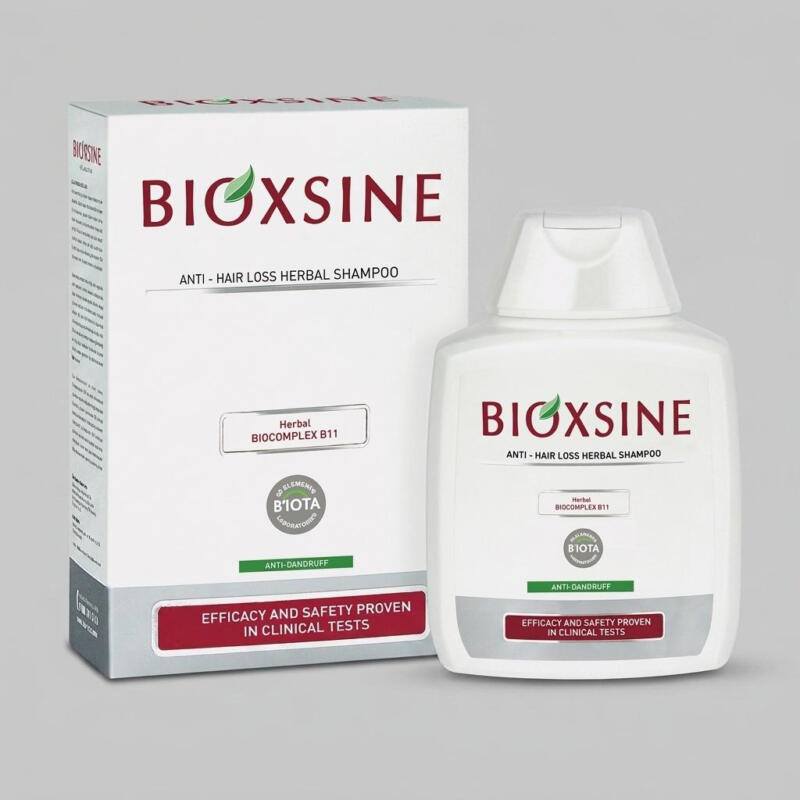 شامپو ضد ریزش و ضد شوره بیوتا مدل BIOXSINE حجم 300 میلی‌لیتر، تقویت‌کننده و تغذیه‌کننده مو با ویتامین‌ها و مواد معدنی، مناسب انواع مو، کاملاً گیاهی و بدون مواد رنگی